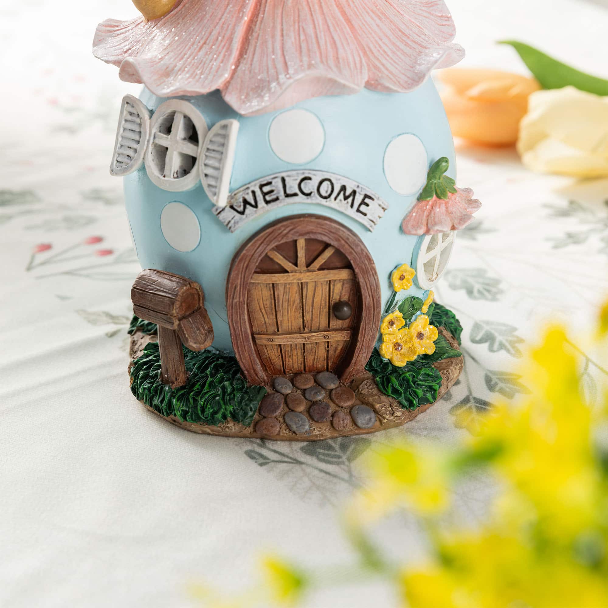 Glitzhome® 8" Lighted Easter Resin Egg-Shaped House Table Decor
